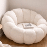 ÉCLAT ( sillón lounge diseño circular y volúmenes acolchados )